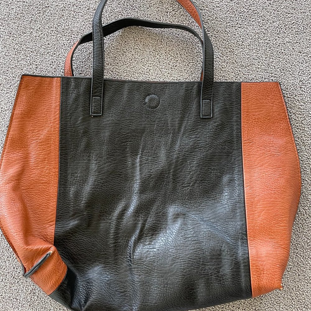 Black and tan leather bag